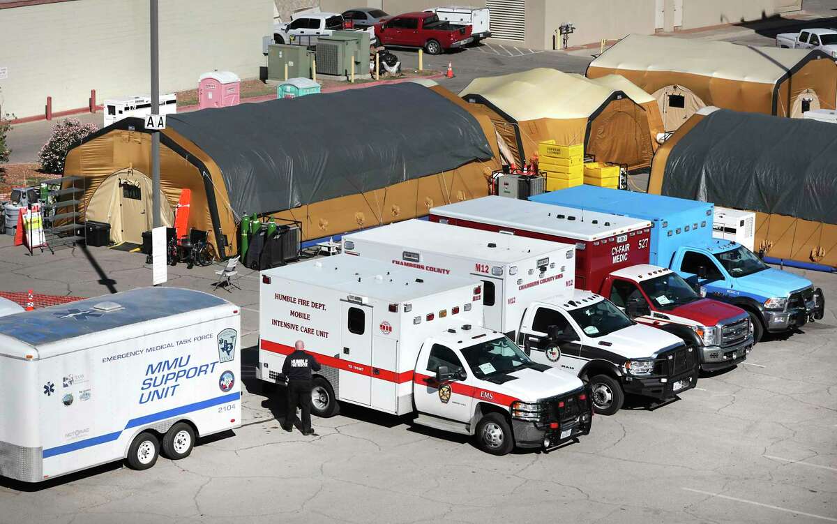 Tent hospitals, staff and equipment provided by the state have been set up in the parking lot of Texas Tech University Health Sciences Center El Paso.