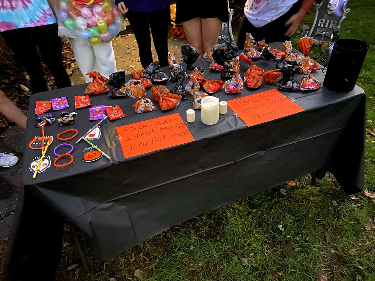 Self-serve table of Halloween treats.