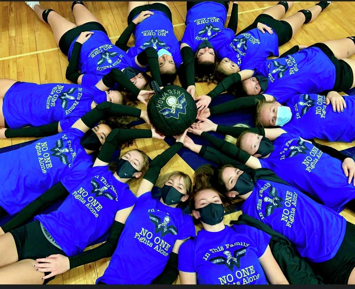 The Morley Stanwood volleyball team poses in their Whipple Warrior t-shirts. Students with the volleyball team raised $2,500 for sixth-grade teacher Michelle Howarth. (Courtesy photo)