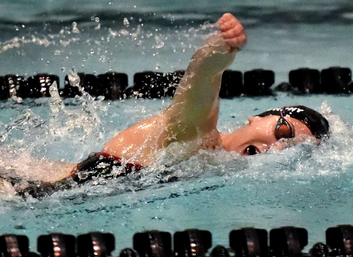 Sophie Murphy of Cheshire swims to a first-place finish in the 4th heat of the 200-yard freestyle during the 2019 SCC Girls Swimming Championship at Southern Connecticut State University.