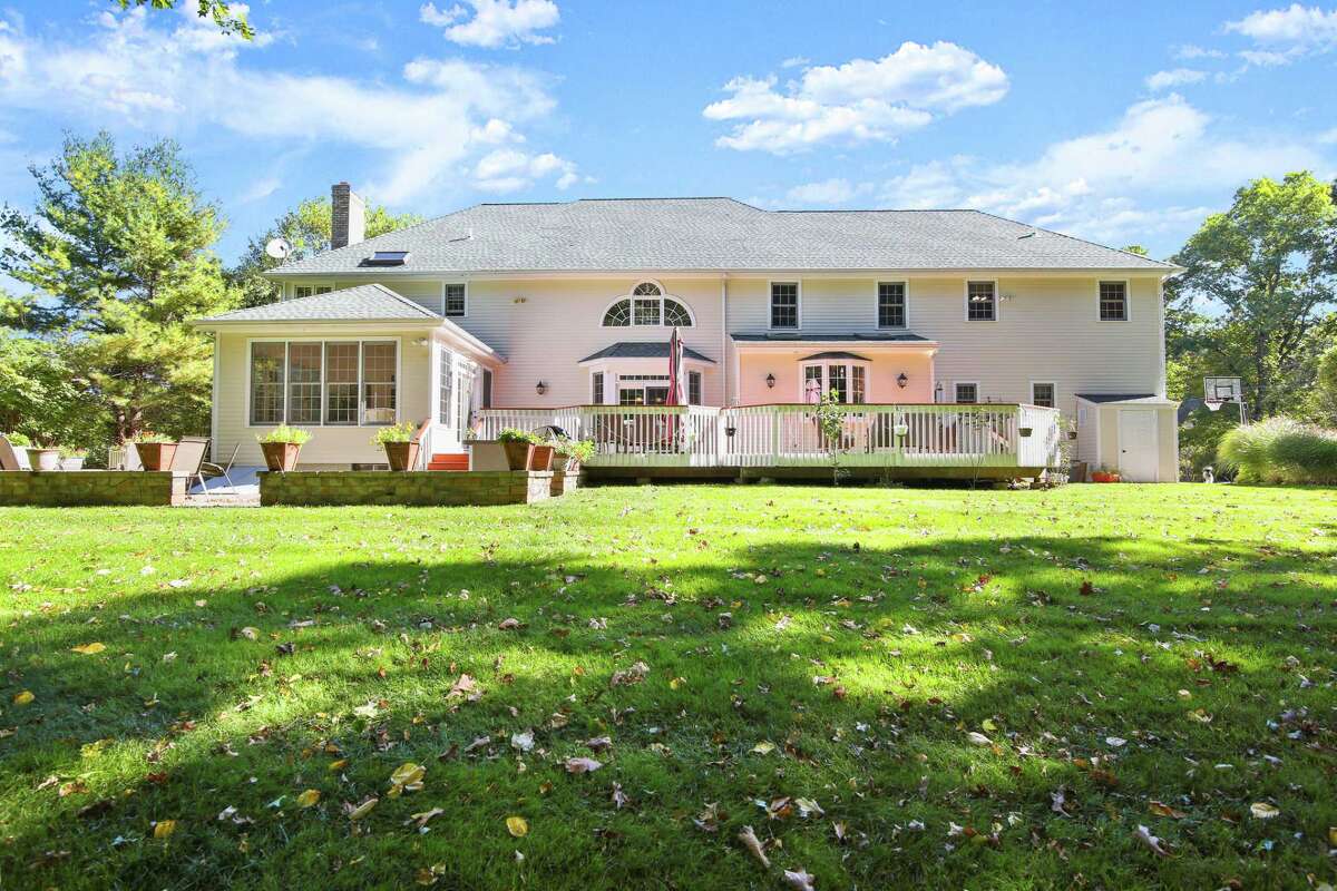 This large yard and its deck and patio are ideal for relaxation and entertaining. For more information or to make an appointment to see the house contact Jeanne Bracken of Kelly Higgins & Associates and Coldwell Banker Realty at 203-981-4114 or jeanne.bracken@cbmoves.com.