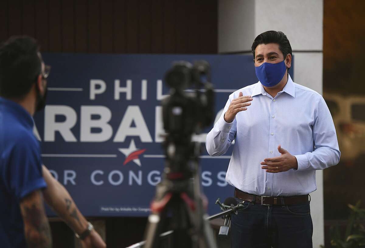 Democrat Phil Arballo, running for U.S. House challenging Devin Nunes for California's 22nd Congressional District, appears for media interviews outside his campaign headquarters on election night Tuesday, Nov. 3, 2020, in Fresno, Calif.