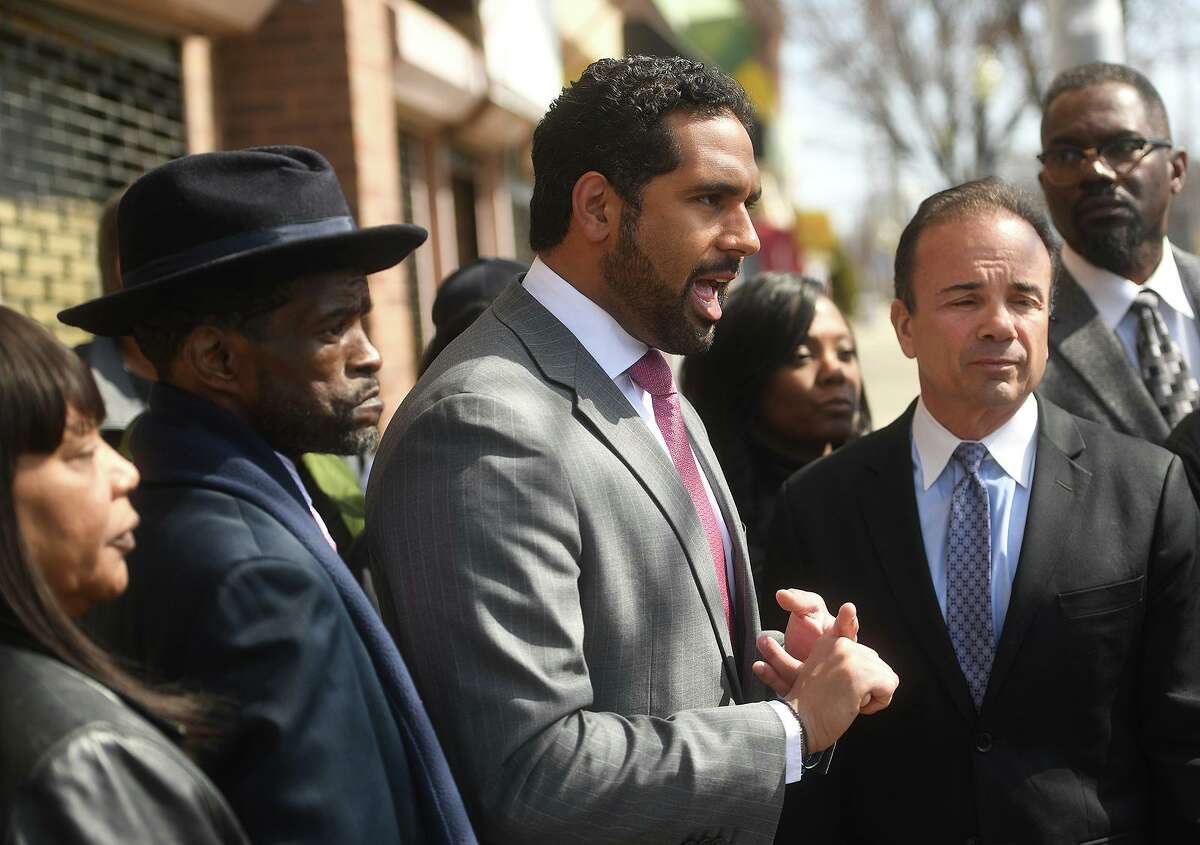 State Senator Dennis Bradley speaks strongly about the need to reopen the old East End police substation at a press conference seeking solutions to Bridgeport's violent crime and gun violence problems outside the former substation at 1149 Stratford Avenue in Bridgeport, Conn. on Thursday, March 28, 2019. Flanking Bradley are City Council member Ernest Newton, left, and Bridgeport Mayor Joe Ganim, right.