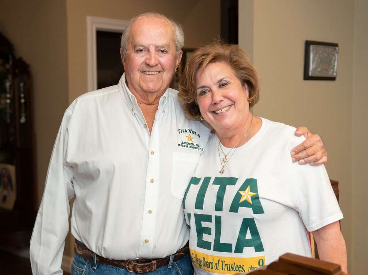 Dr. Carlos Vela Jr. and Tita Vela pose for a photo, Tuesday, Nov. 3, 2020, at their home.