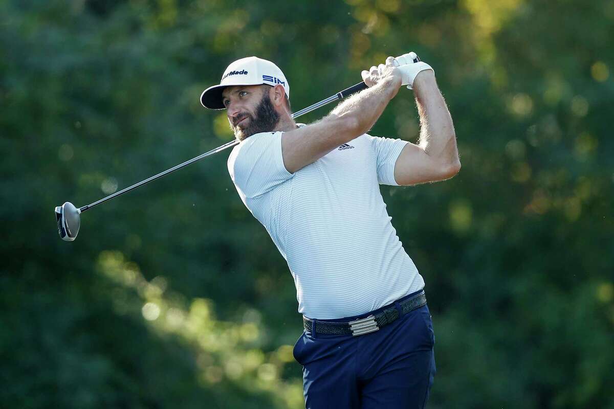 Dustin Johnson plays his shot from the eighth tee during the Pro-Am at the Vivint Houston Open at Memorial Park Golf Course on Wednesday, November 4, 2020.