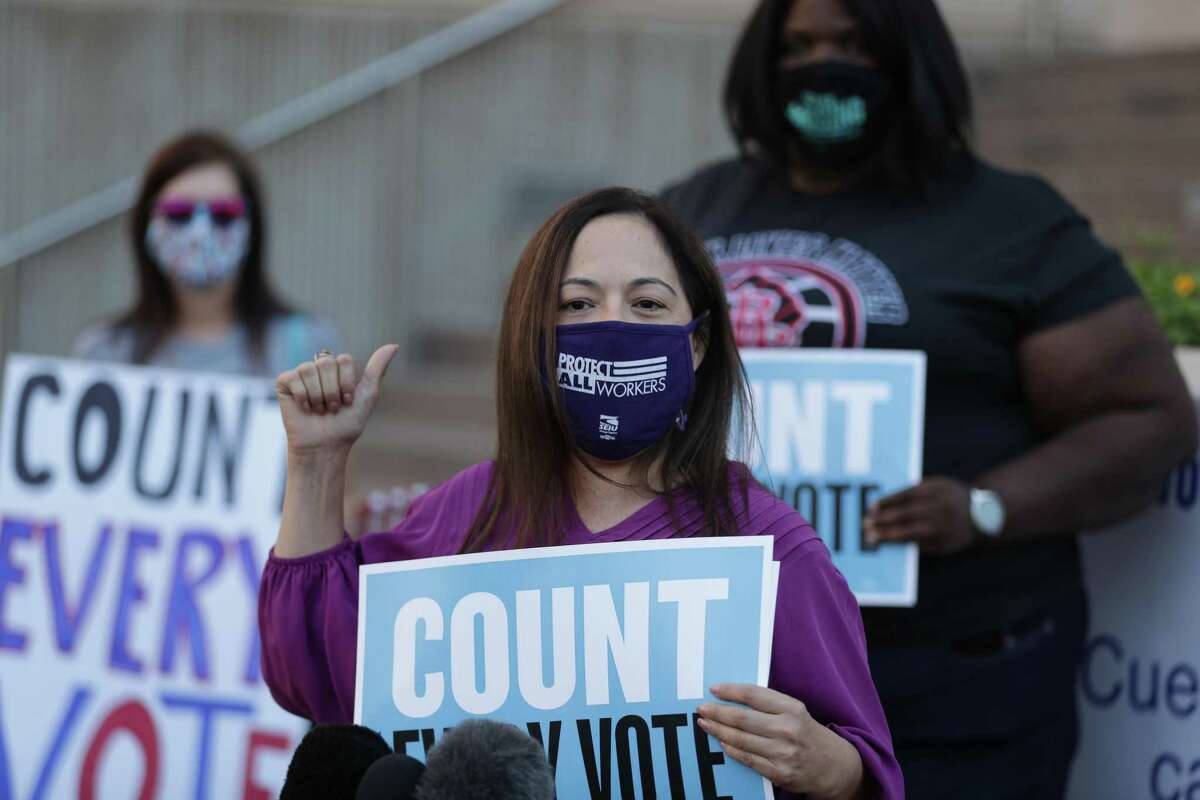 Elsa Caballero, SEIU Texas spokesperson, joined voters, non-voters, and protectors of democracy, to make public statements in response to on-going election procedures at a press conference in front of the Harris County Clerk’s Office Wednesday, Nov. 4, 2020, in Houston.