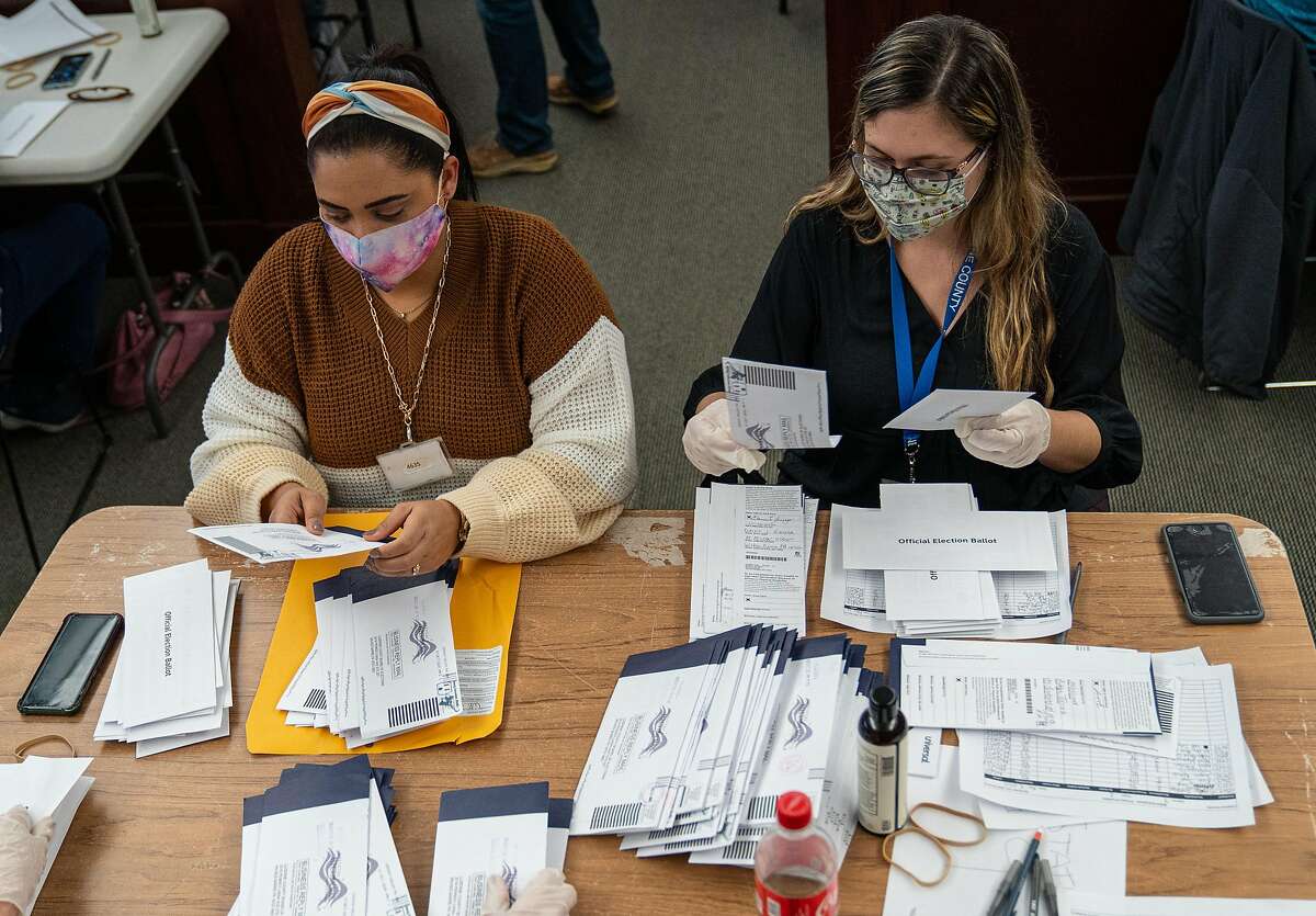 Workers sort ballots in Wilkes Barre, Penn., Nov. 4, 2020. President Donald Trump�s campaign intervened at the Supreme Court in a case challenging Pennsylvania�s plan to count ballots received for up to three days after Election Day. (Robert Nickelsberg/The New York Times)