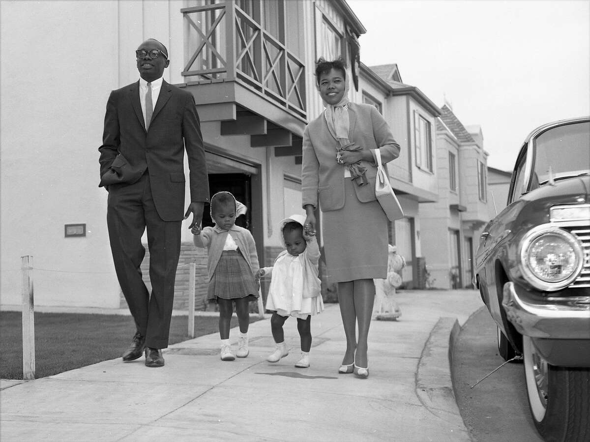 Attorney Willie Brown and his wife and children sit-in at a housing development in San Francisco, where they faced discrimination when they wanted to tour a new home, May 28, 1961.