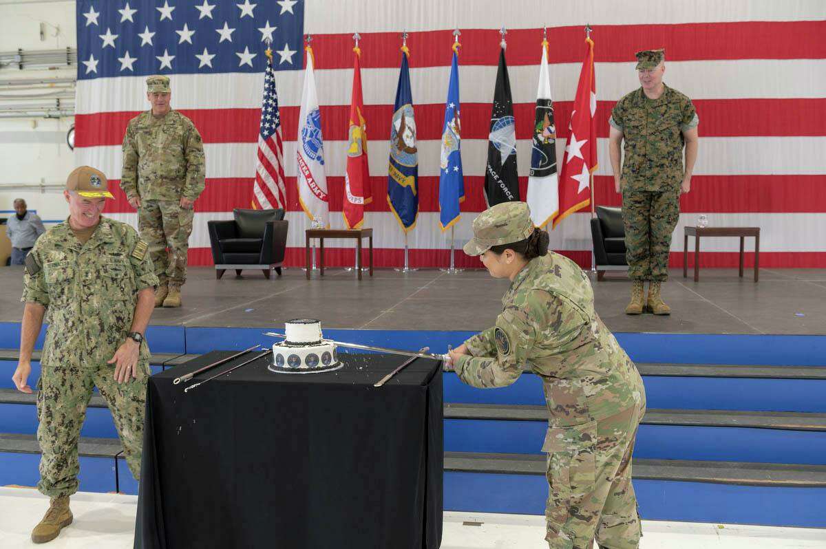U.S. Air Force Staff Sgt. Kiara Kashner, right, and U.S. Navy Rear Adm. Michael Bernacchi, representing U.S. Space Command’s longest-serving and junior-serving members, respectively, cut a cake in honor of the combatant command’s first birthday Aug. 28, 2020, at Peterson Air Force Base, Colorado. Kashner serves as executive assistant to the commandant and Bernacchi is Strategy, Plans and Policy director. Space Command was officially established Aug. 29, 2019, during a ceremony in the White House Rose Garden with President Donald Trump.