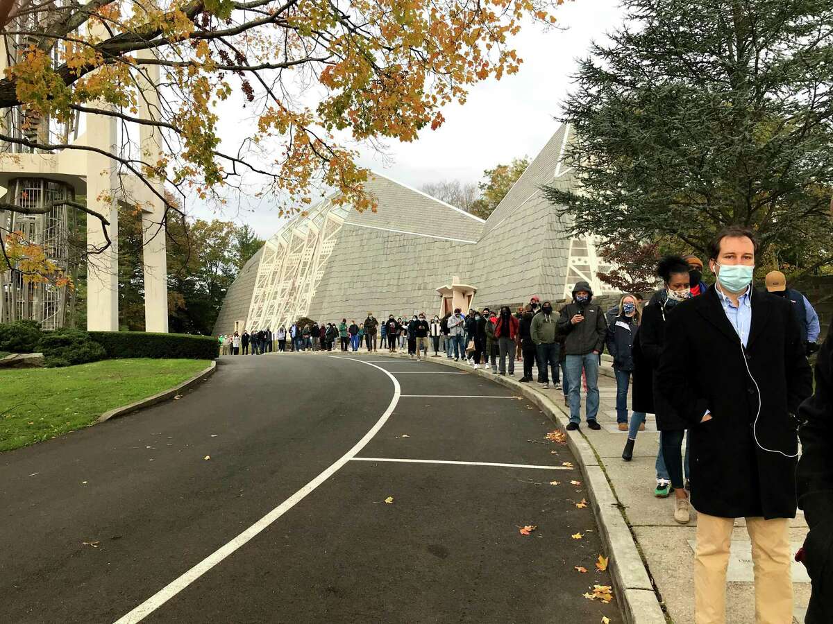 Voters queue up to vote at Stamford’s First Presbyterian Church, Nov. 3, 2020.