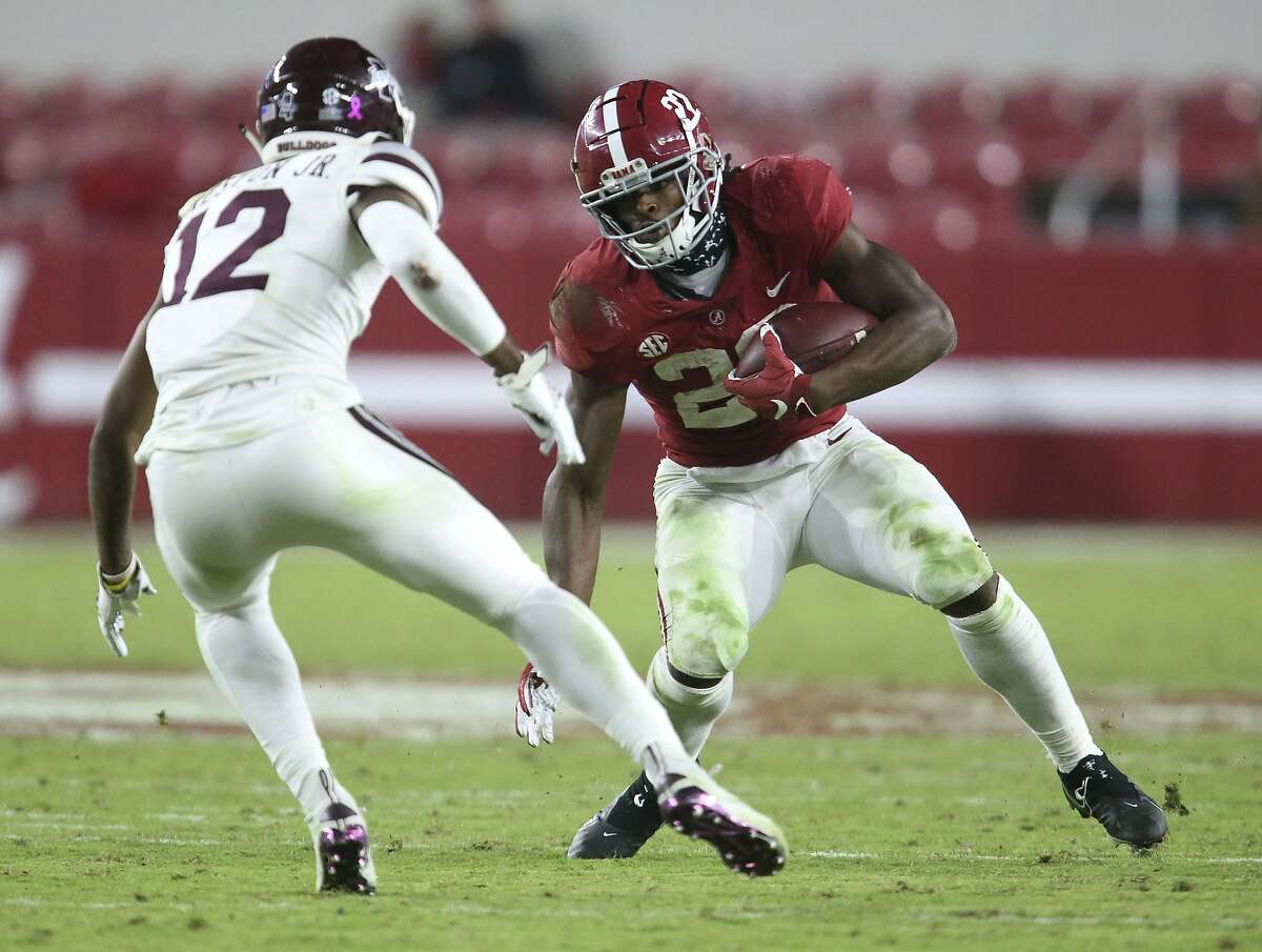 Najee Harris wins Alabama pro day from the sidelines