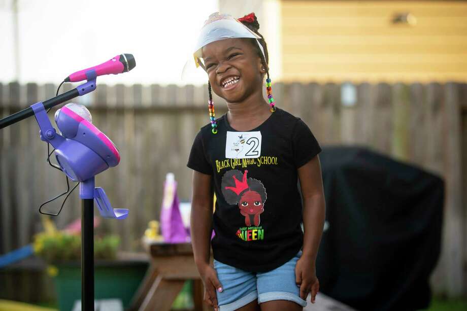 Urennaya Unaka, 4, laughs as she answers a question. Photo: Mark Mulligan, Staff Photographer / © 2020 Mark Mulligan / Houston Chronicle