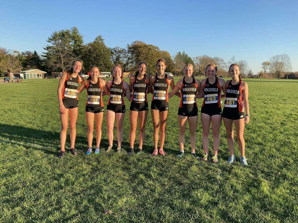 The Ridgefield girls cross country team won the FCIAC Central Region championship on Wednesday in New Canaan.