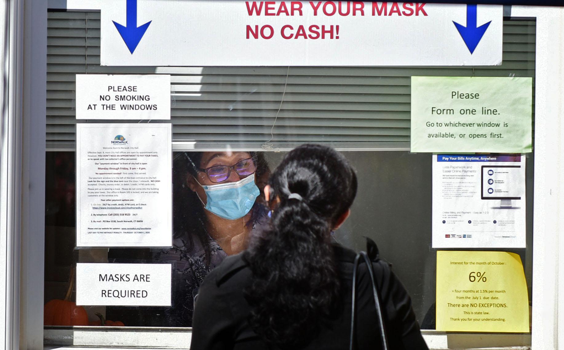 Norwalk tax collection window closed after employee tests positive for