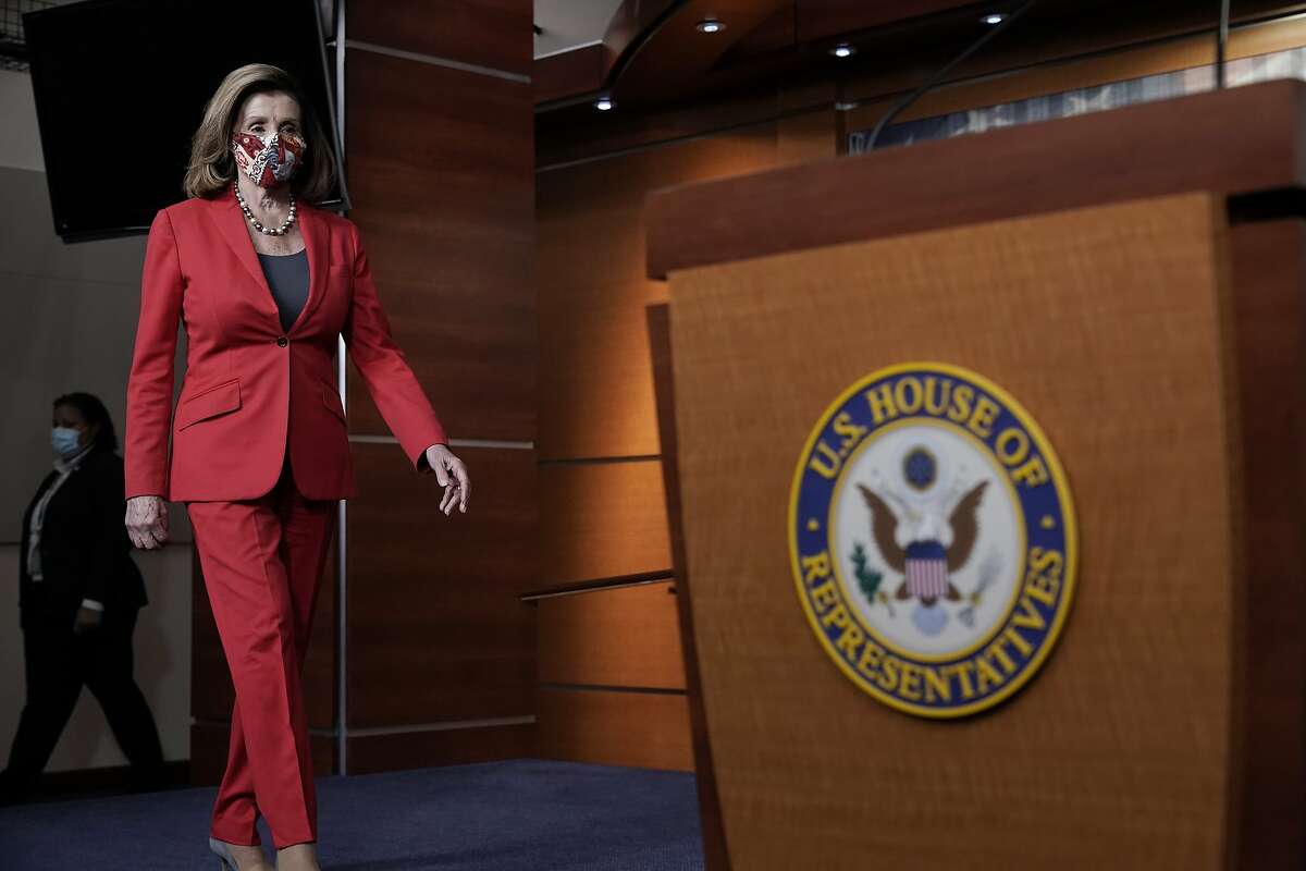 House Speaker Nancy Pelosi, D-San Francisco, arrives for a news conference Friday in Washington, D.C.