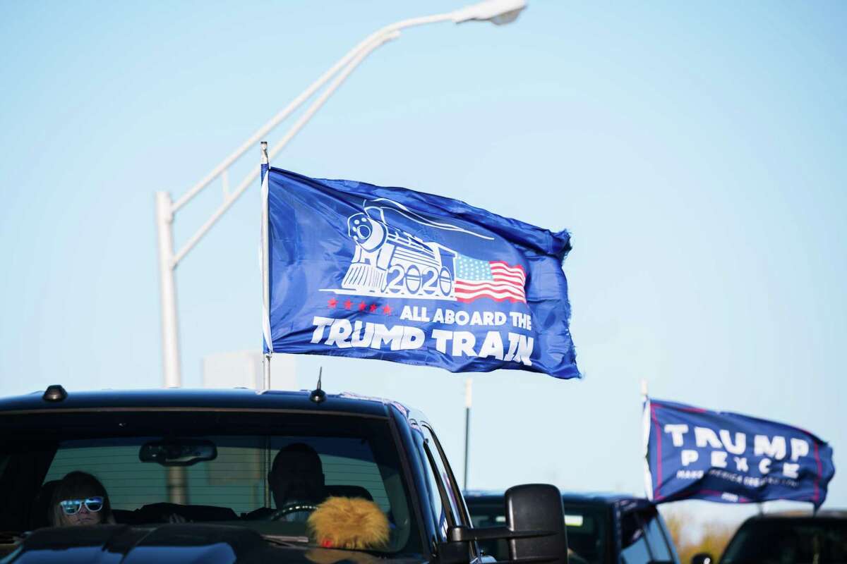 A “Trump Train” caravan drive makes its way through Louisville, Kentucky, on Sunday.