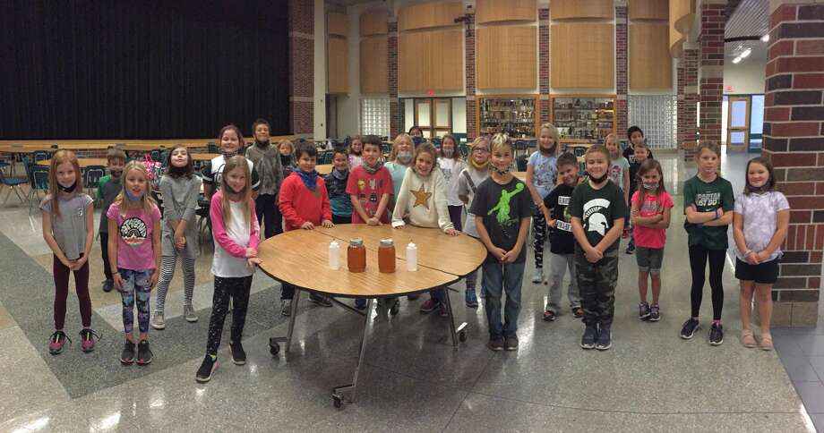 Onekama Consolidated Schools third and fourth grade students were treated to a pancake lunch on Friday. The syrup was made last spring as part of a project by teacher Ben Mauntler's second grade class. Photo: Courtesy Photo