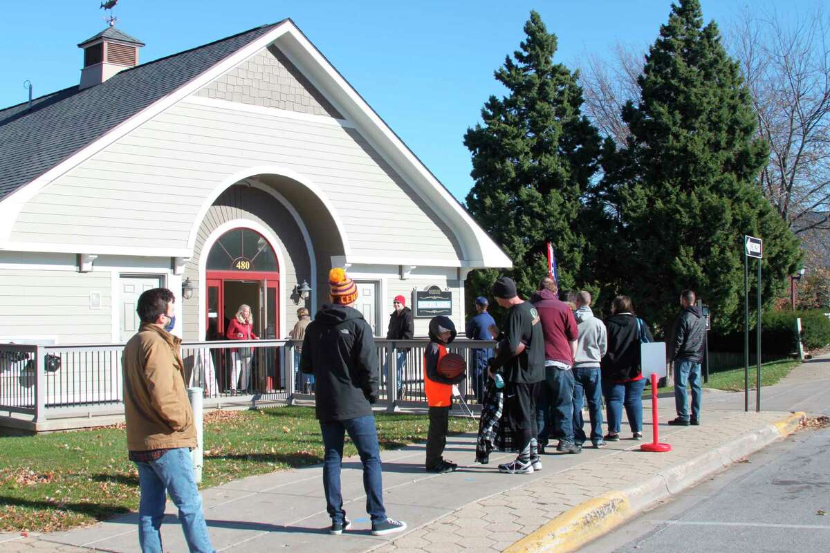 Manistee voters wait in line during the Nov. 3 presidential election. Local election officials report being inundated with calls from people demanding to know if their votes had been counted. (File Photo)
