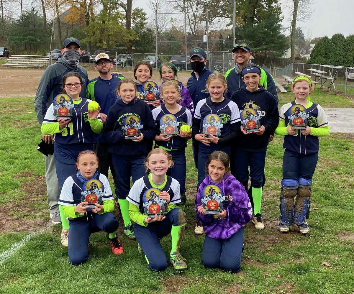 The Milford Barracudas show their trophies after winning the 10U Southington Fall Softball League Tournament at the end of their eight-week fall season. Team members (front row) are: Grace Weber, Cayleigh Glynn and Sophia Montini; (second row) Dani Kotansky, Emma Bonanno, Sammy Marini, Riley Fagan-Davies, Lia Veteri and Mia Abrams-Sartor; (third row) coach Bryan Glynn, coach Pete Abrams, Emily Speringo, Addie McKenna-Hansen, coach John Marini and coach Mike Bonanno.