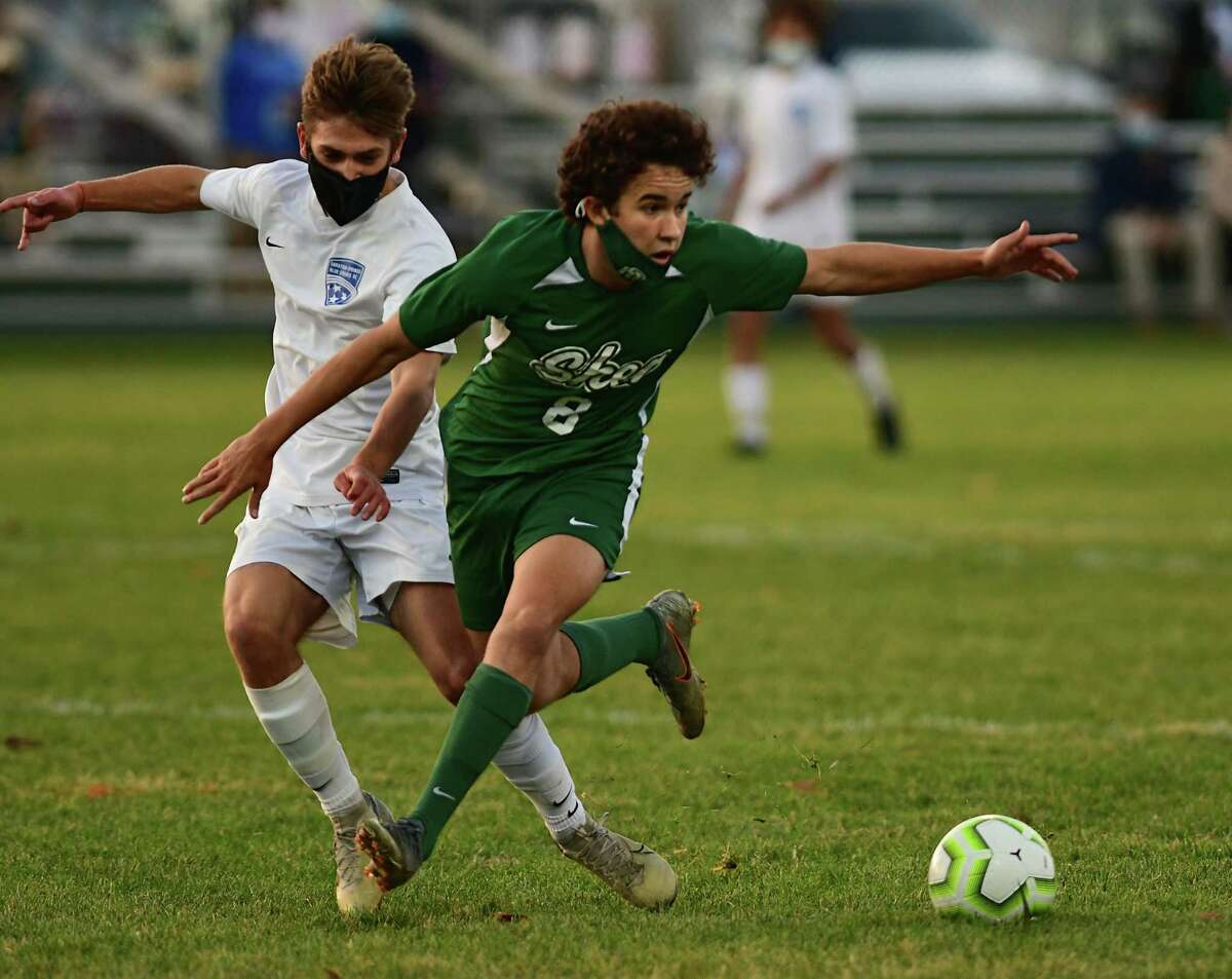 Saratoga's Evan Hallett, left, battles with Shenendehowa's Zak Smith during a soccer game on Friday, Nov. 6, 2020 in Clifton Park, N.Y. (Lori Van Buren/Times Union)