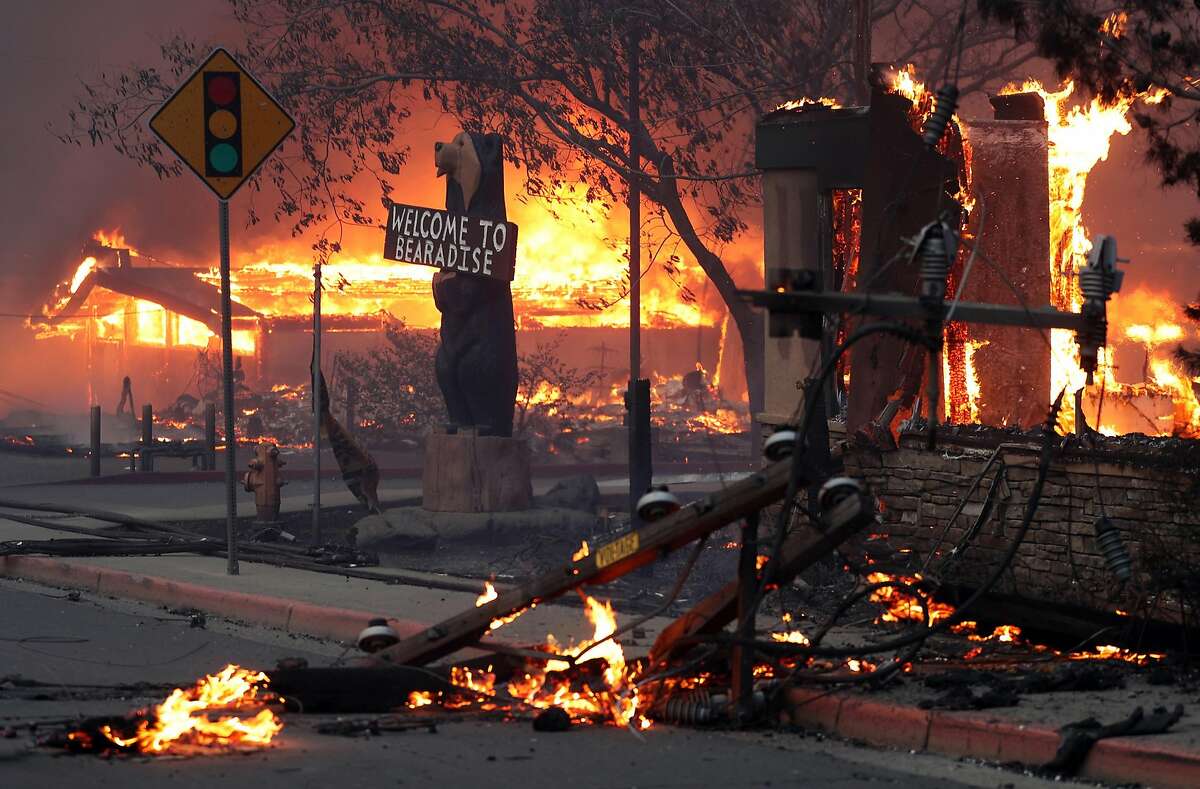A Black Bear Diner and nearby businesses burn as the Camp Fire destroys a large portion of Paradise in Butte County on Nov. 8, 2018.