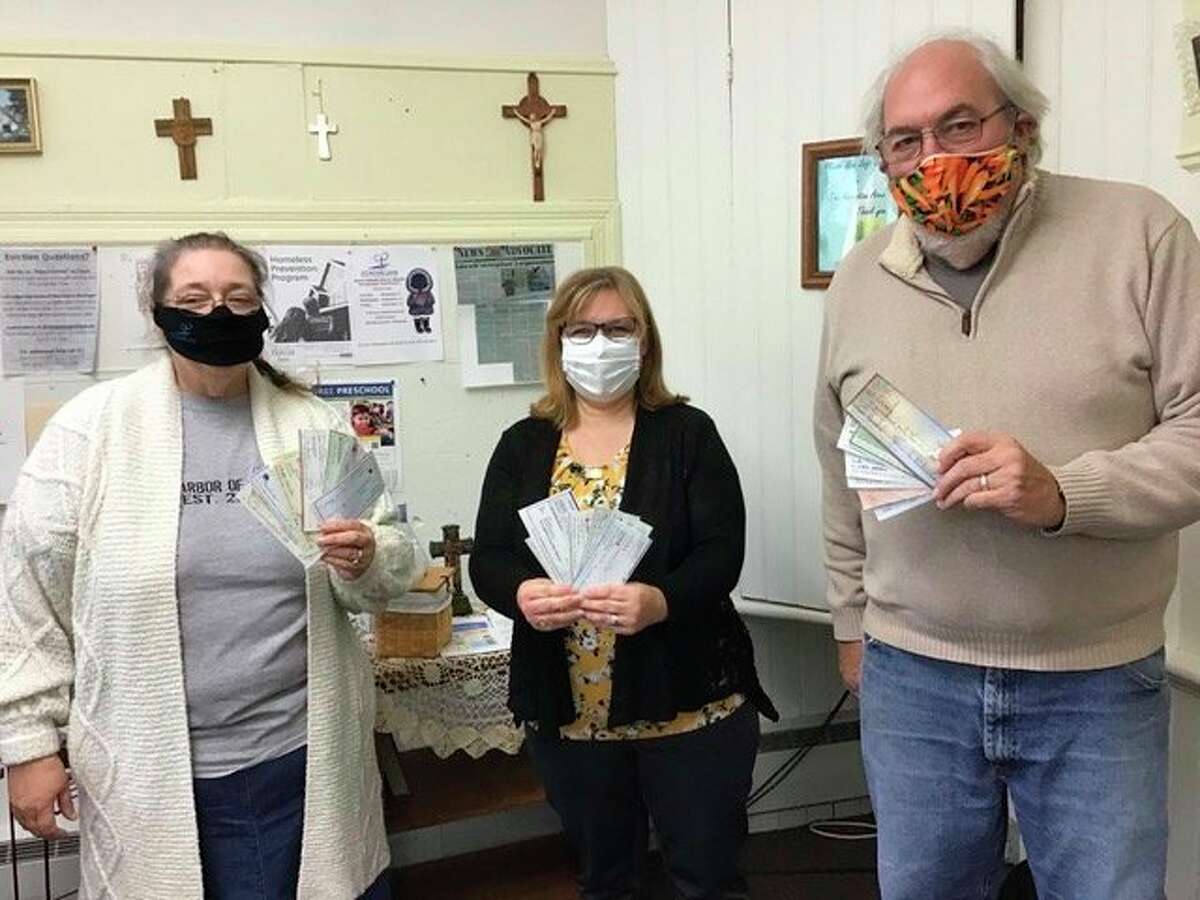 (From Left) Lisa Clarke, of ECHO; Robin Paulus, of ECHO; and Al Frye, of Men Who Care. (Courtesy photo)