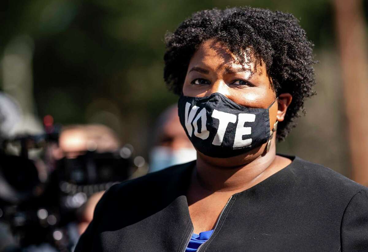 FILE - Stacey Abrams led an event with voters at the Coan Recreation Center in Atlanta on Election Day, 2020.