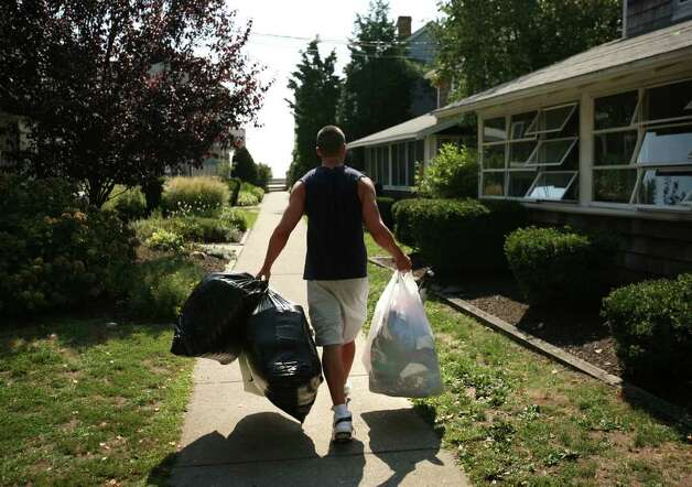Fairfield University Senior Steve Bodell 21 Of Simsbury 316091 Fairfield University Senior Steve Bodell 21 Of Simsbury Carries Some His Belongings To