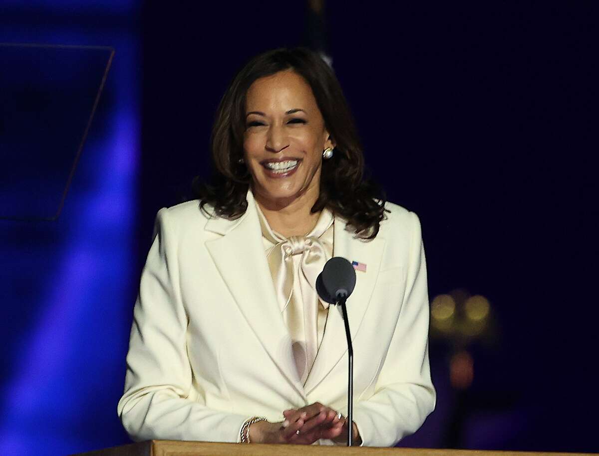 Vice President-elect Kamala Harris takes the stage before President-elect Joe Biden addresses the nation from the Chase Center on Nov. 7, 2020, in Wilmington, Del.