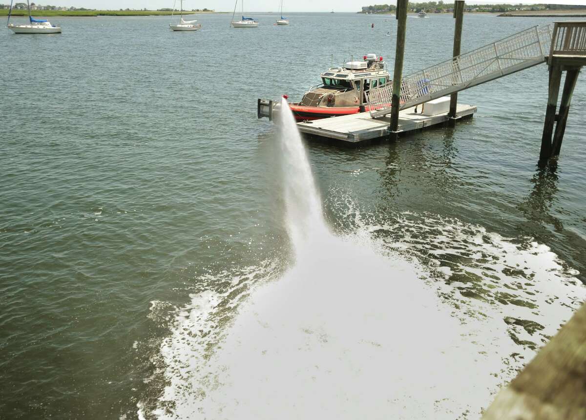 The Stratford Fire Department tests out their fire boat and its high powered water cannon from the dock at the Birdseye Street boat launch in Stratford, Conn. on Tuesday, August 1, 2017.
