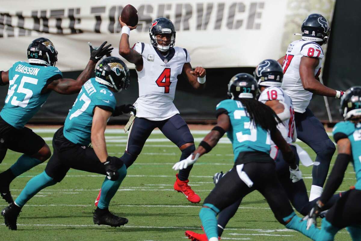 Houston Texans quarterback Deshaun Watson passes the ball against the Jacksonville Jaguars during the first half an NFL football game at TIAA Bank Field Sunday, Nov. 8, 2020, in Jacksonville, Fla.