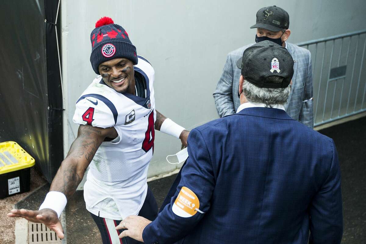 Houston Texans quarterback Deshaun Watson (4) shakes hands with Texans CEO Cal McNair after the Texans 27-25 win over the Jacksonville Jaguars in an NFL football game at TIAA Bank Field Sunday, Nov. 8, 2020, in Jacksonville.