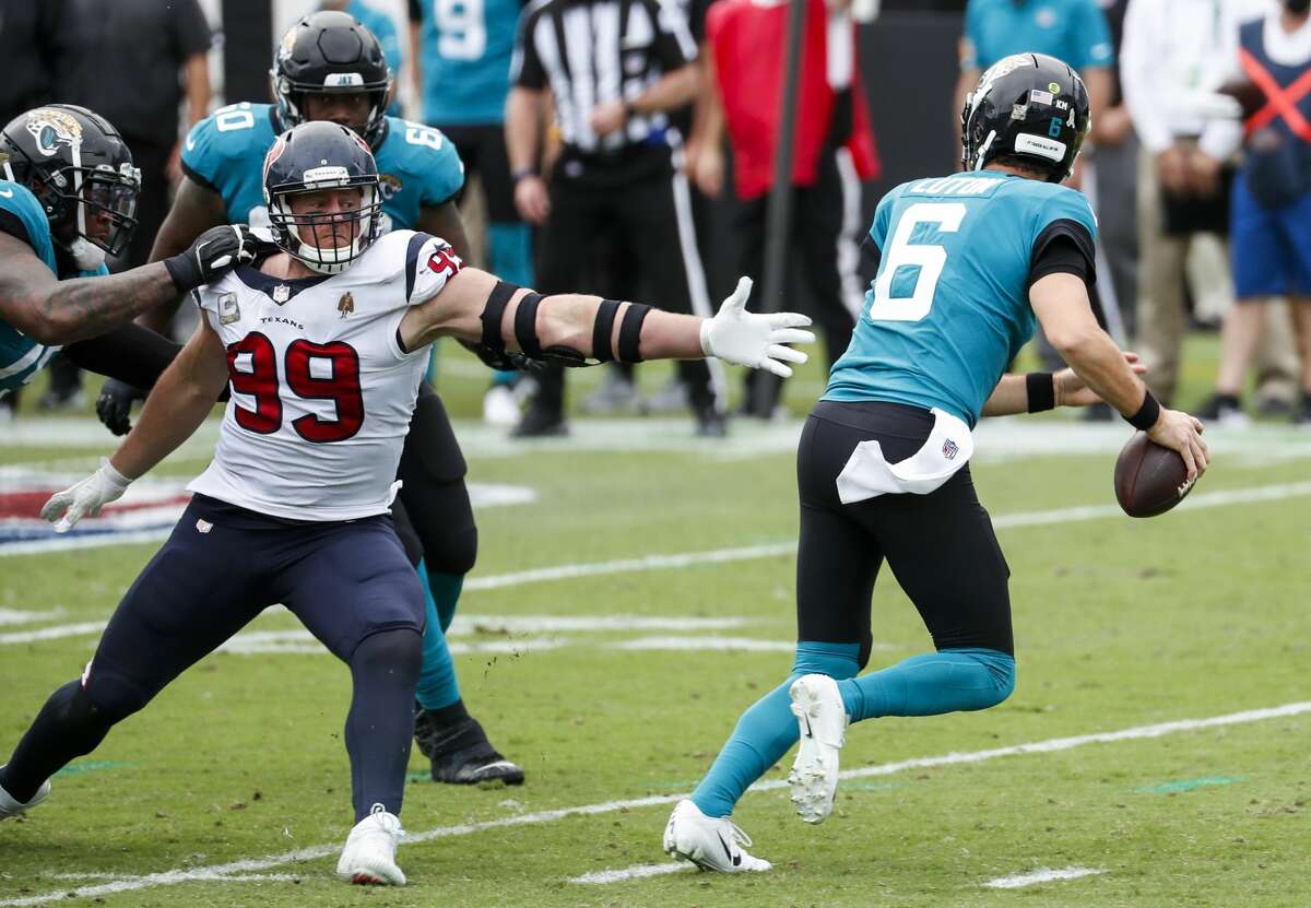 Jacksonville Jaguars quarterback Jake Luton (6) steps just out of the reach of Houston Texans defensive end J.J. Watt (99) during the second half of an NFL football game at TIAA Bank Field Sunday, Nov. 8, 2020, in Jacksonville.