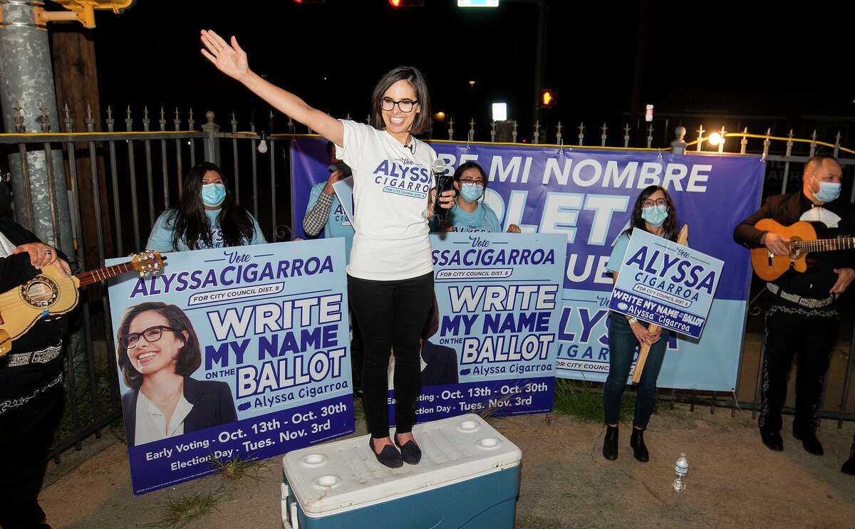 Laredo City Council District VIII candidate Alyssa Cigarroa thanks her supporters, Thursday, outside her campaign headquarters. Cigarroa will be in a December run-off election.
