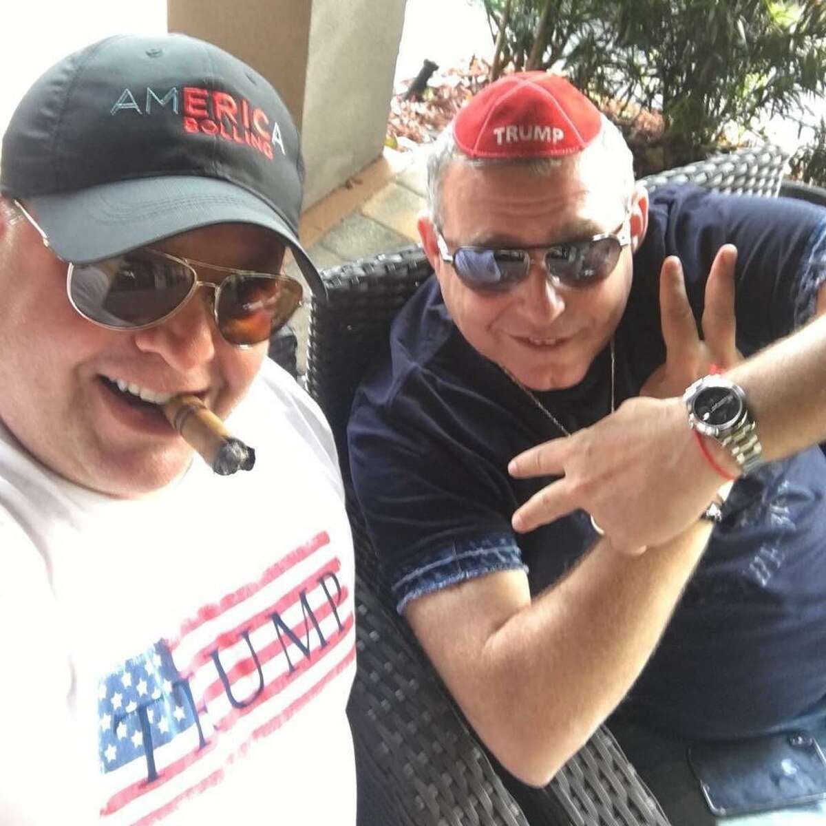 Robert Hyde (left) smokes a cigar with Lev Parnas (right) in this un-dated photo sent by Hyde to Hearst Connecticut Media. Hyde has filed paperwork to run for U.S. Senate in 2022.