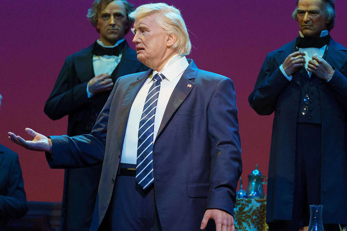 Donald Trump has drawn both cheers and boos in his featured role in Disney's Hall of Presidents.