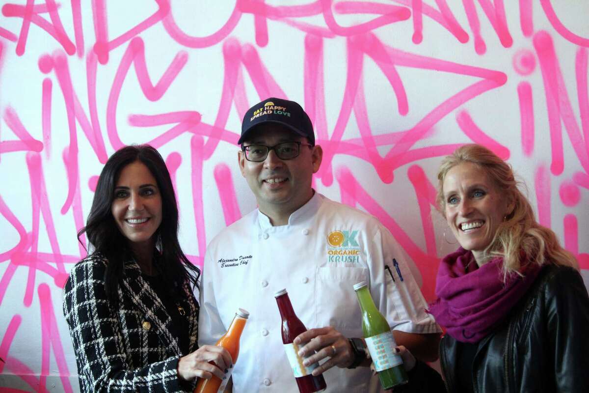 Organic Krush co-owner Fran Paniccia, left, Executive Chef Alejandro Duarte, middle, and Organic Krush co-owner Michelle Walrath. Taken Nov. 2, 2020 in Westport, Conn. Michelle Walrath and Fran Paniccia, co-owners of Organic Krush, first started the business six years ago after the two had trouble finding a healthy eatery while traveling on the road with their kids.