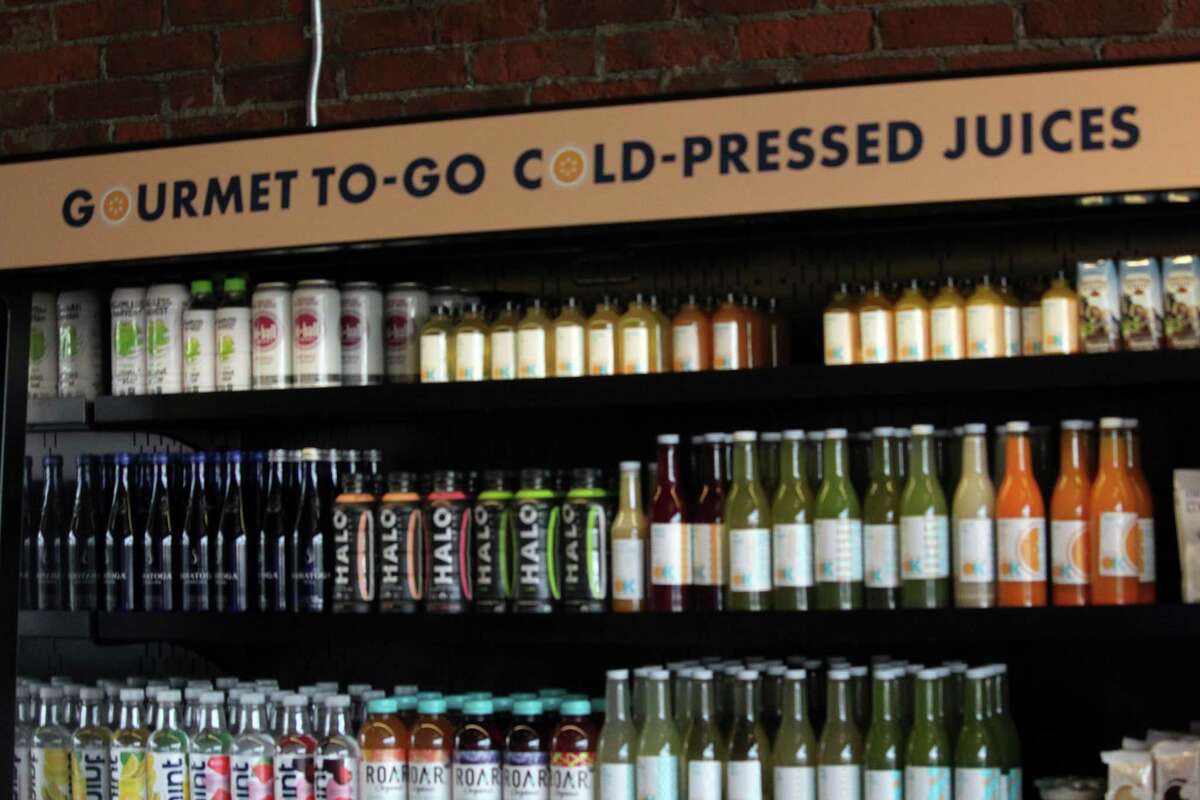 Organic Krush offers an assortment of cold-pressed juices for its customers. Taken Nov. 2, 2020 in Westport, Conn. Walrath said both families were so used to cooking healthy options for their families, but on the road selections were slim. She said Paniccia and her both started wondering how healthy eateries didn't exist across the country and joked they should start one.