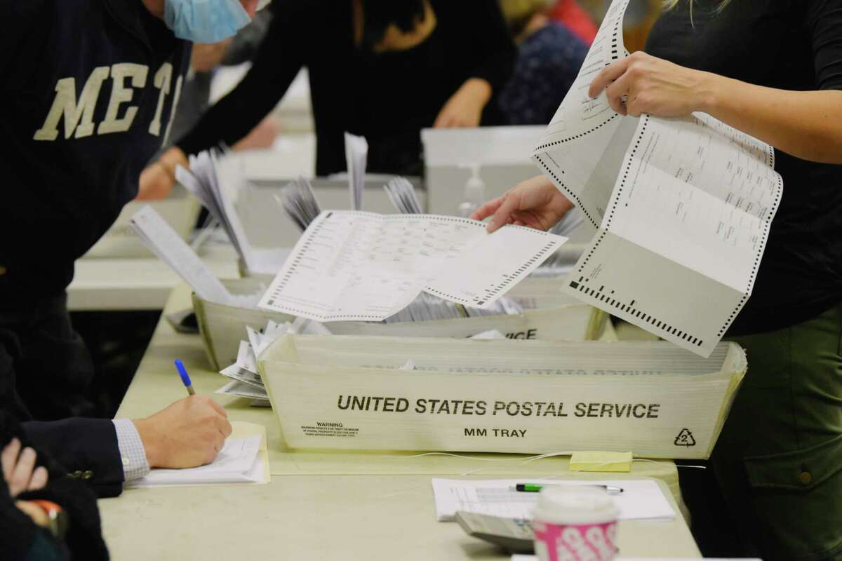 Saratoga County Board of Elections workers begin the process of counting absentee ballots on Tuesday, Nov. 10, 2020, in Ballston Spa, N.Y. (Paul Buckowski/Times Union)