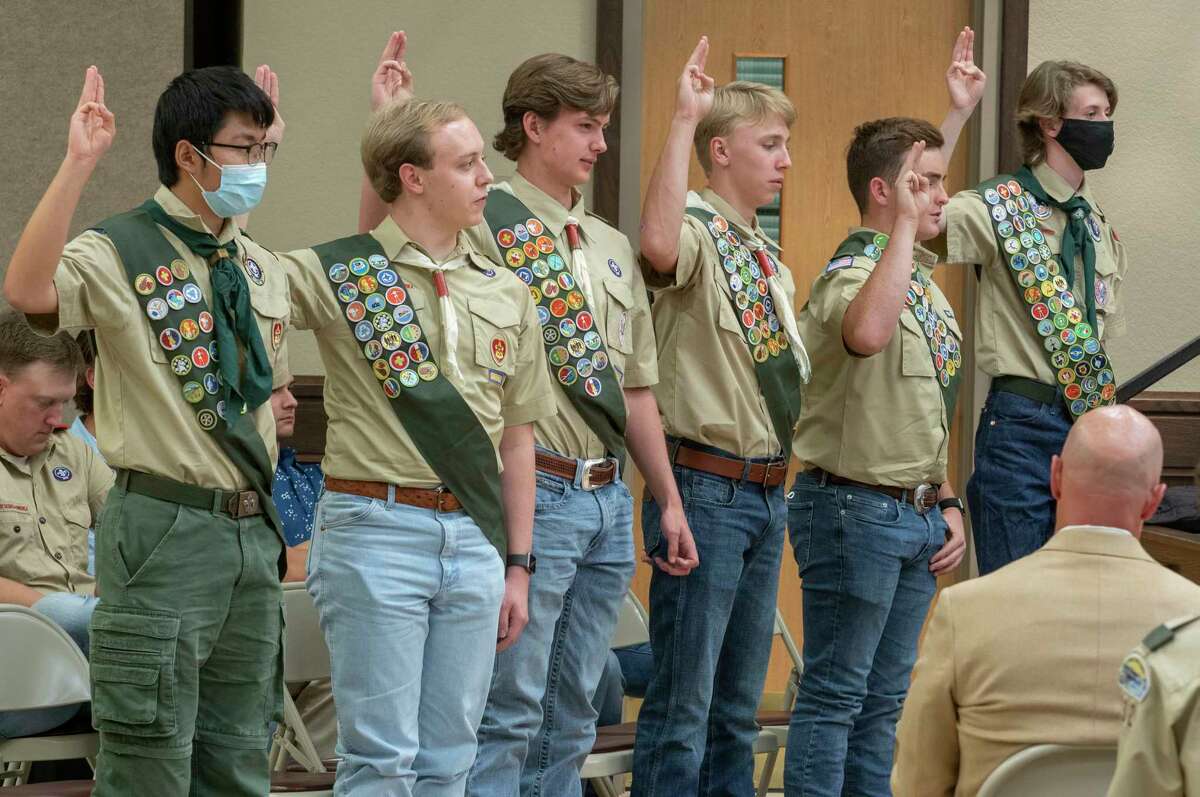 Scouts in Troop 232 raise their hand to recite their Eagle Scout Oath 11/09/2020 during a ceremony honoring the 6. From left, Jing Li, Leighton Petty, Kyle Cheatham, Andrew Strahan, Nathan Walker and Richard Werner earned their Eagle Badge. Tim Fischer/Reporter-Telegram