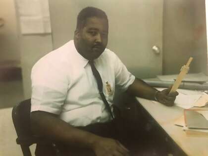 Jerry Lawson and his slide rule — the calculator before calculators — in the 1960s.