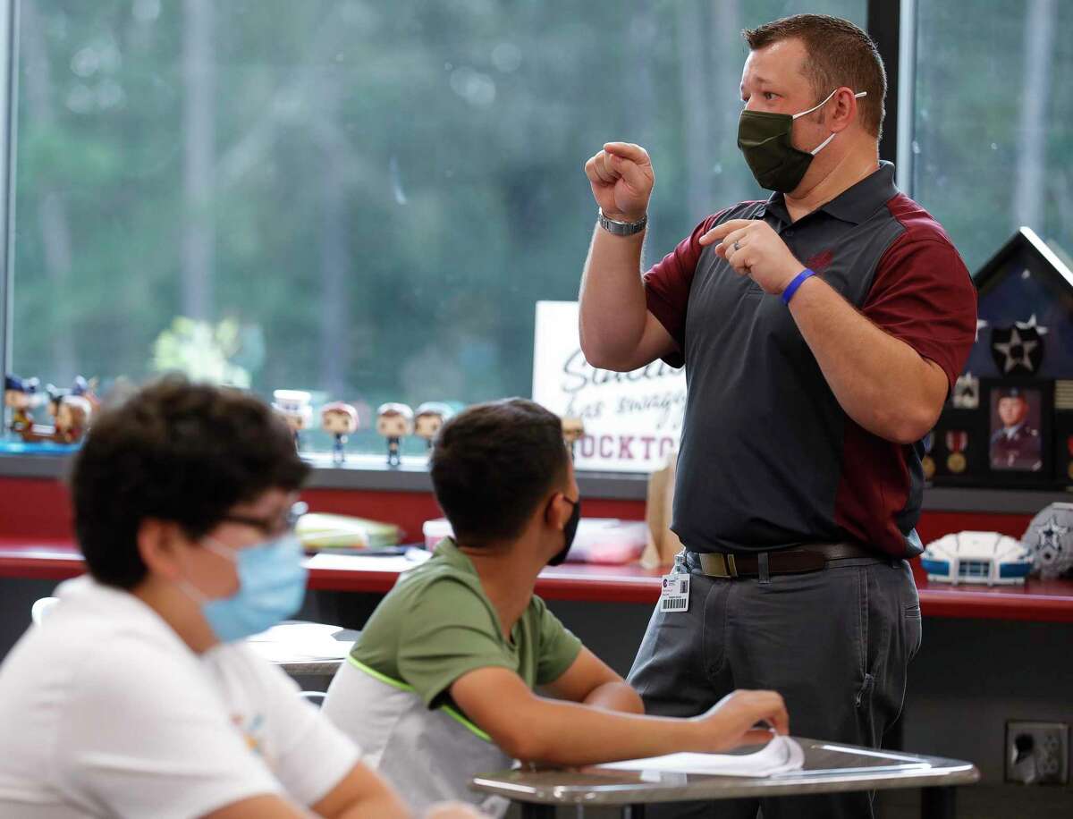 Seventh grade history teacher Robert Simard instructs students at the start of class at Stockton Junior High School on the first day of in-person school for Conroe ISD on Sept. 8 in Conroe. Conroe ISD students are set to return to class on Aug. 11. But as students return, the strict COVID-19 mandates of last year will not, and the district won’t be able to mandate that students positive with COVID-19 stay home to isolate.