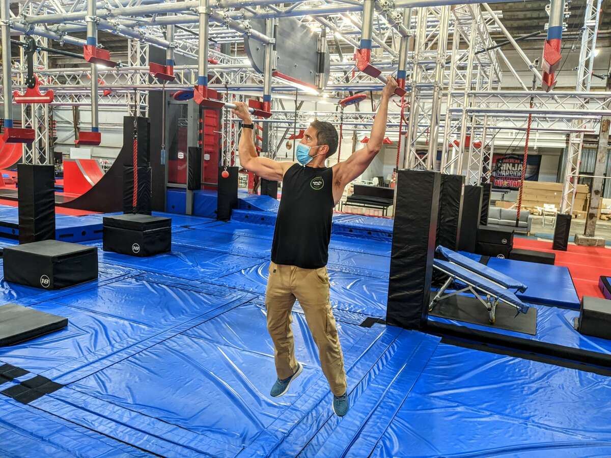 Executive manager Troy Helming works out at the Traverse Fitness gym in Richmond.