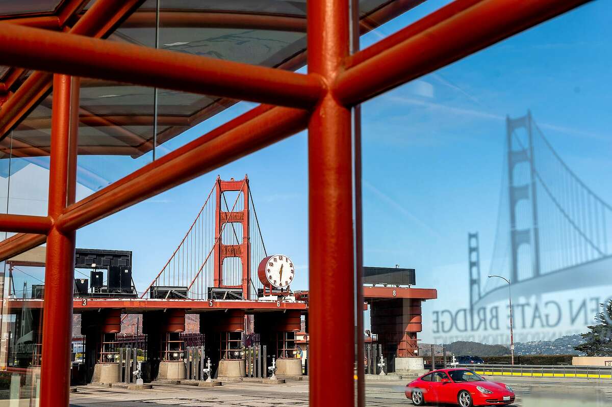 A car passes the Golden Gate Bridge toll plaza on Tuesday, Nov. 10, 2020, in San Francisco.