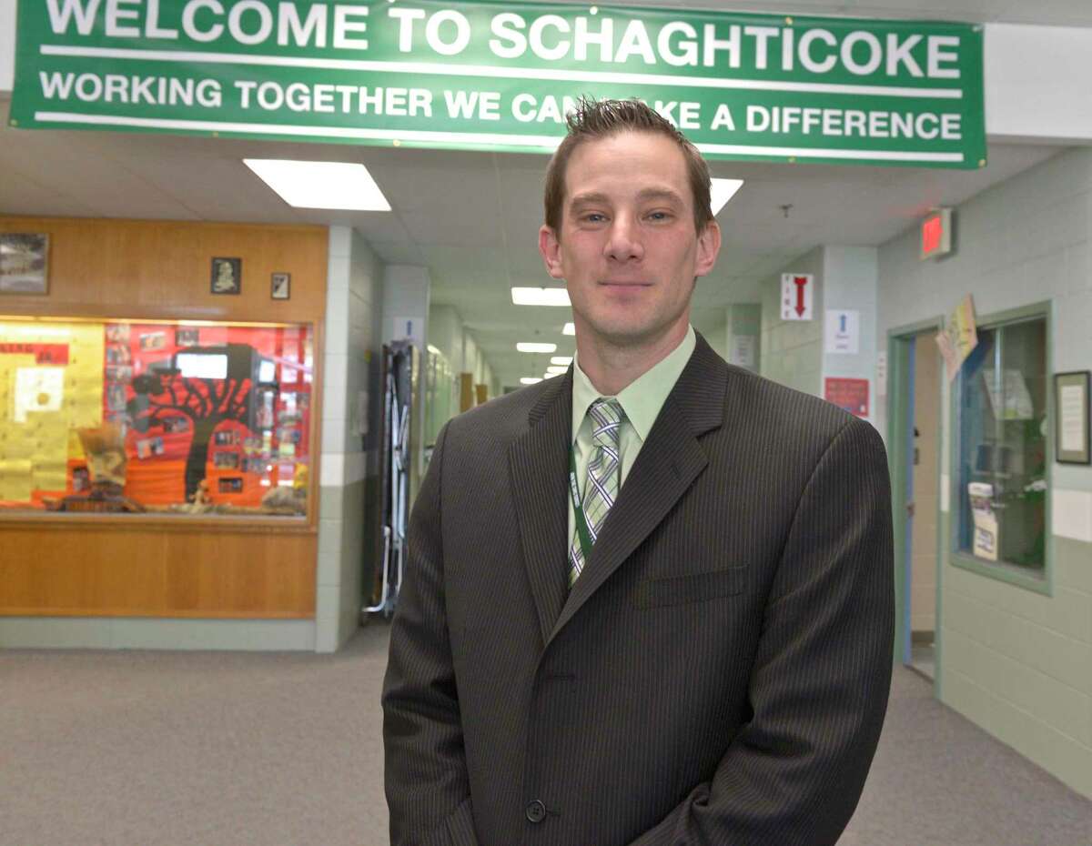 New Milford Public Schools was notified of three positive COVID cases in the middle school community Monday. SMS, whose principal is Dr. Christpher Longo, above, will go remote for a week.