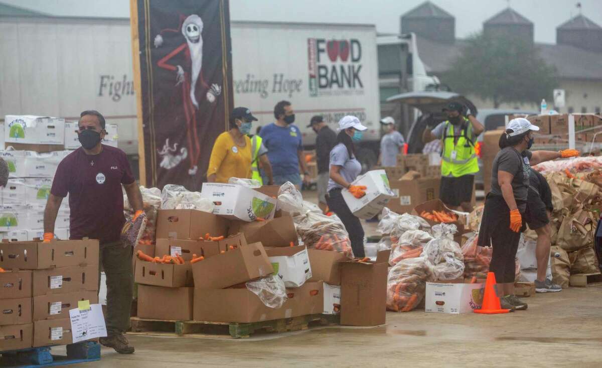 ‘It helps tremendously’ Hundreds of cars line up for free food from