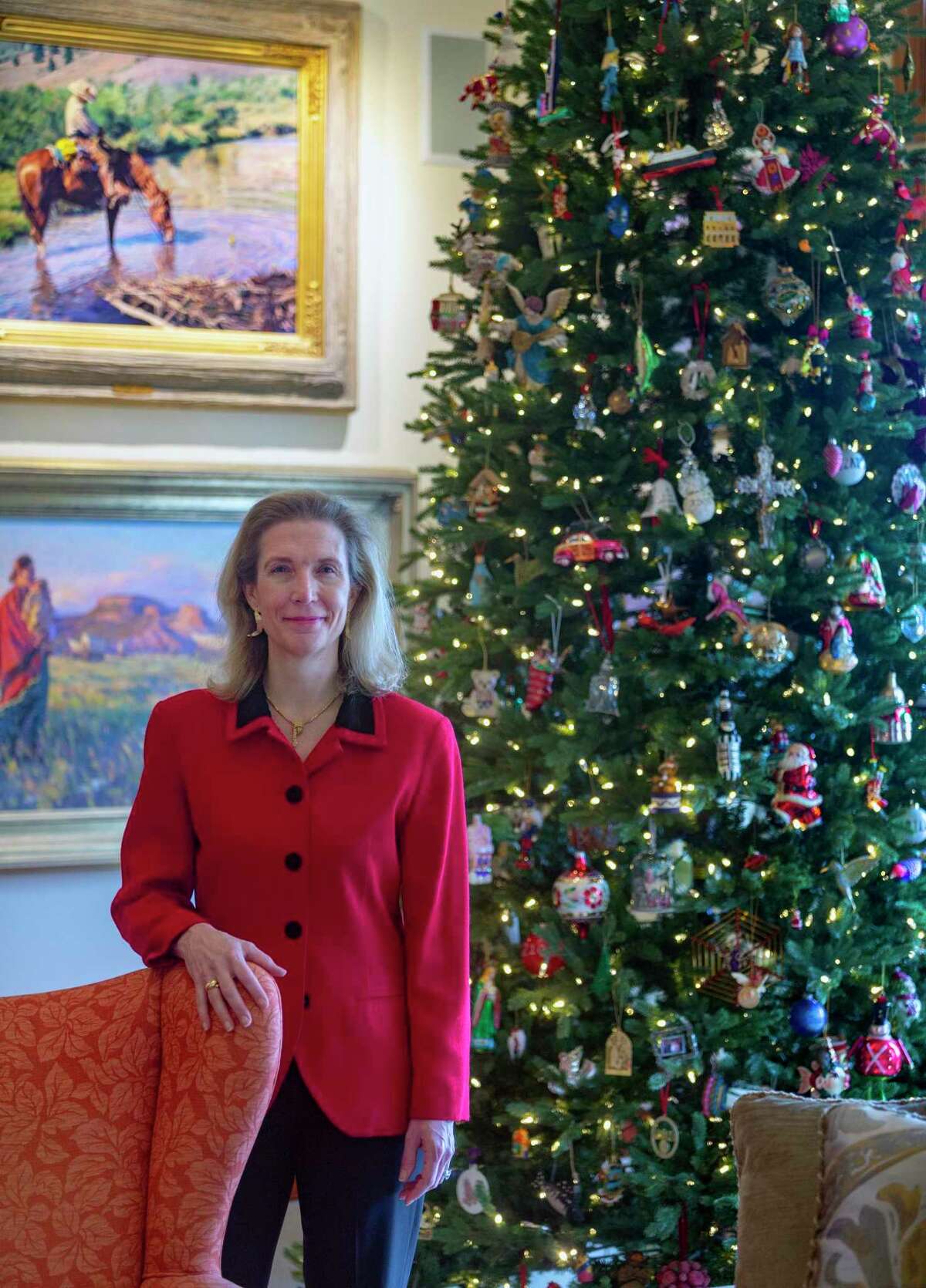 Abigail Kampmann in front of her Christmas tree. She decorated her home for Christmas early this year and inspired her friends to do the same.