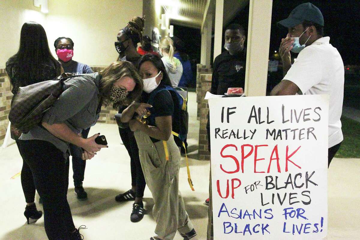 Supporters of Zekee Rayford stage a protest during the Schertz city council meeting on Nov. 10, 2020.