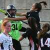 Ridgefield celebrates after beating Staples High School in their FCIAC Central field hockey championship game Tuesday, Novemver 10, 2020, in Westport, Conn.
