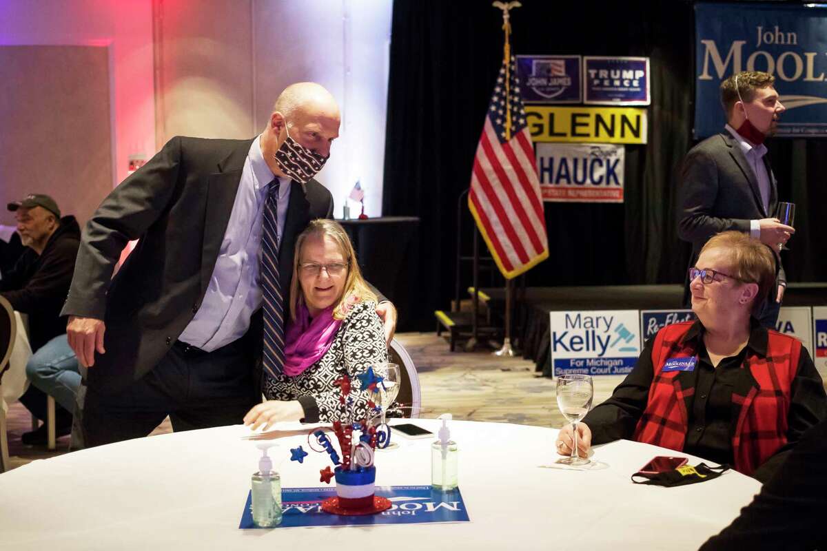 U.S. Rep. John Moolenaar chats with Midland County republicans as supporters gathered for an Election Night watch party on Tuesday, Nov. 3 at The H Hotel in Midland. Moolenaar was declared the victor in the Michigan District 4 U.S. House of Representatives race, according to the Associated Press. Michigan's Fourth Congressional District includes Osceola County. (Katy Kildee/kkildee@mdn.net)